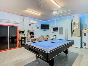 - Play your way with a full size pool table, arcade games, foosball, and dual TVs
- Bright, air conditioned space with fun wall art and colorful lighting throughout
- Perfect for keeping the whole crew entertained, rain or shine