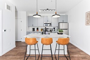 You can almost hear the sizzle of ingredients as you cook in the well-equipped kitchen, where every detail is designed for convenience.