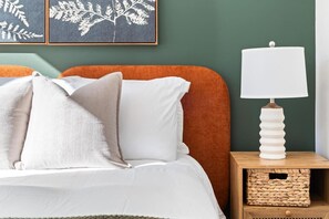 As you enter the bedroom, the sophisticated decor and plush bedding create a space where you can truly unwind.