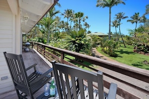 Relax on the lanai with a lush tropical view