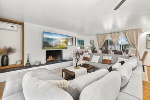 Step into comfort! Our cozy living room is perfect for relaxation together.