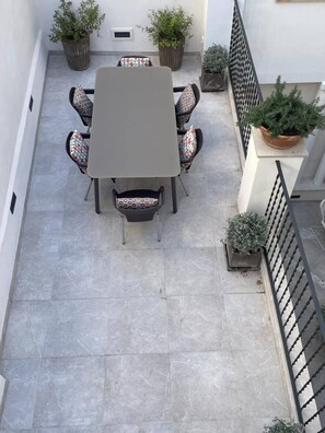 As well as the garden, there is a dinning terrace.  