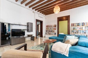 The massive living room has two separate sitting areas.