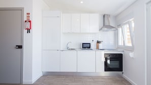 The kitchenette has all the amenities you'll need for your meals #homecooking #clean #portugal #pt #lisbon
