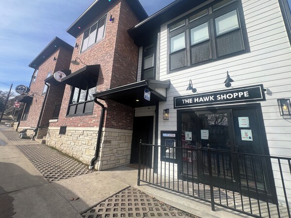 The Birdcage sits in-between The Hawk Tavern and above The Hawk Shoppe