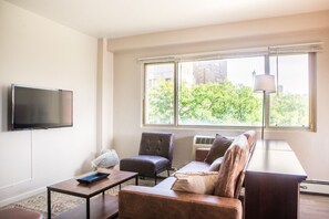 Spacious living room with dedicated workspace
