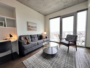 Comfortable living room with private balcony