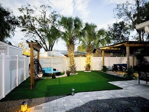 Unwind in style under the spacious 16x16 pergola with your favorite shows on the outdoor smart TV.