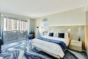 Primary Bedroom | Provides access to your private balcony, king sized bed, and en suite bathroom.