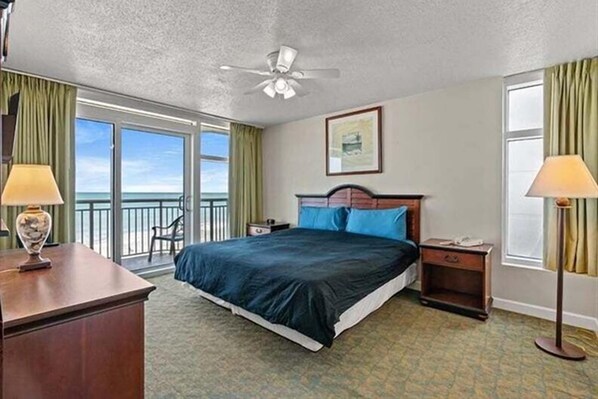 Huge Glass Doors Facing the Ocean in the Master Bedroom