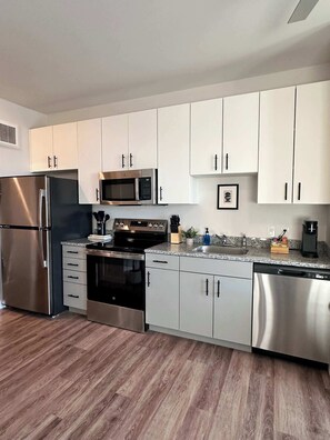 Featuring stainless steel appliances, ample cabinet space, and all the essentials you need to cook and enjoy meals during your stay. A perfect blend of style and functionality!