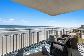 Beautiful corner balcony showing views of the beach. 