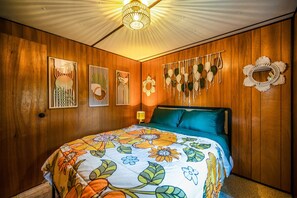 Comfy bed and funky decor