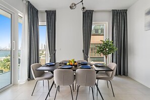 Dining Room: Enjoy gourmet meals with stunning views in this chic, stylish setting!