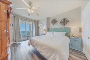 Gulf front master bedroom with a king size bed.