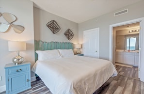 Gulf front master bedroom with a king size bed.