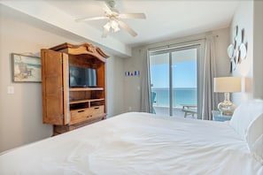 Gulf front master bedroom with a king size bed.