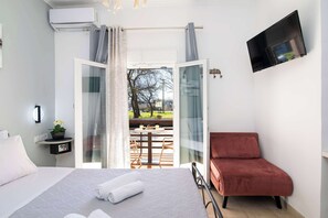 Room with access to a balcony