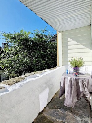 Two chairs and a table.  A perfect spot for the morning coffee