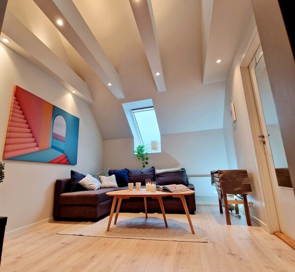 Living room with tall ceilings.