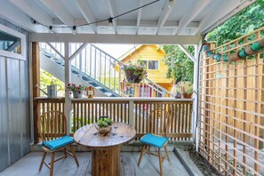 Private covered patio - great for a cup of your fave beverage and bird watching!
