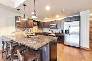 Unit C | Chef's Kitchen with Breakfast Bar