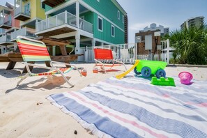 No need to worry about packing beach toys for your kids – we've got you covered! Beach cart and towels included as well! The sandbar is the perfect place for the little ones to build sandcastles!