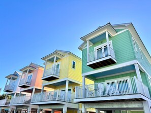 Each bungalow features spacious open-concept living areas, fully stocked kitchens, and two covered balconies for dining or unwinding outdoors. The bedrooms are equipped with plush king-sized beds, ensuite bathrooms, and fresh linens, offering a peaceful re