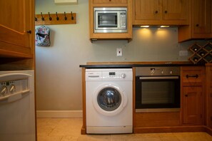 Utility with electric oven and microwave
