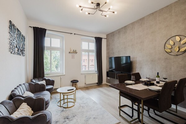 Elegant and spacious: relax or dine in this open-concept living area.