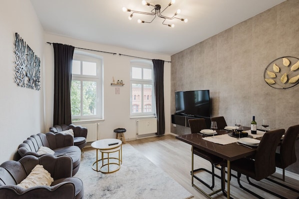 Elegant and spacious: relax or dine in this open-concept living area.