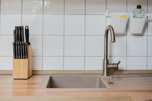 Functional and well-equipped kitchen corner ready for home-cooked meals.