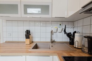 Enjoy cooking in this thoughtfully designed and modern kitchen space.
