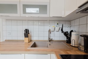 Enjoy cooking in this thoughtfully designed and modern kitchen space.