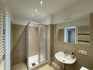 Spacious bathroom with everything you need.