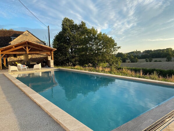 View of pool & pool house