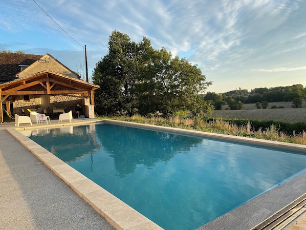 View of pool & pool house