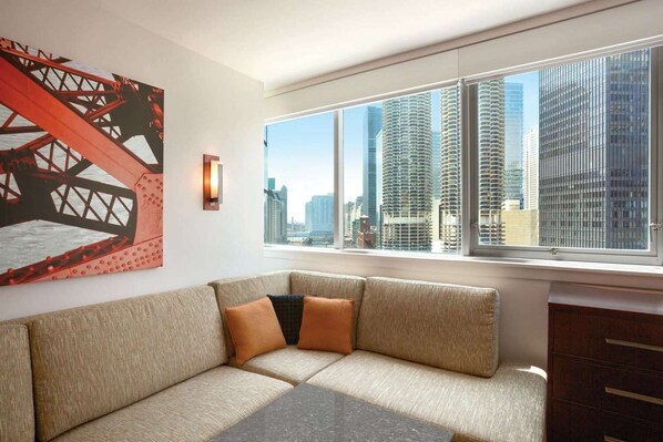 Living Area. Exact unit will be assigned upon arrival. Views, colors, and decor may vary.