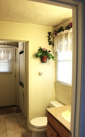  "Downstairs bath with washer/dryer—convenient and efficient! 