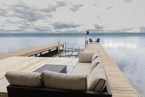 Sprawl out on your private dock—complete with boat lift, seating, and front-row views of Cayuga Lake.