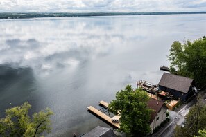 This is lake life at its finest—soak in wide-open views and private waterfront access.