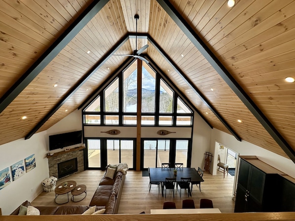 Views of the lower level of the home and down the valley from the landing.