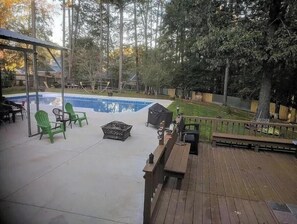 Backyard with deck, patio space and outdoor pool