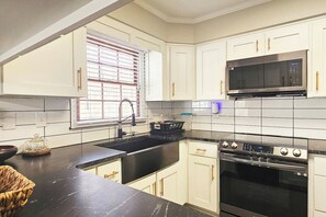 Kitchen - Sink / Stove & Microwave