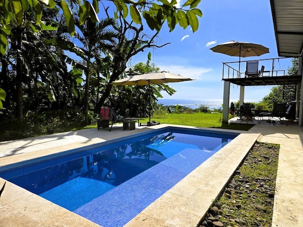 Private pool with ample shade and ocean views