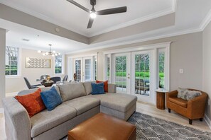 Sit back and watch a movie in this spacious living room