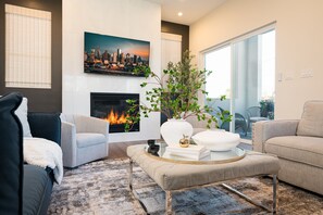 Living Room: Stylish space with modern decor, fireplace.