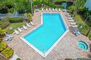 Enjoy lounging by the pool on a chaise lounge or taking a dip in the hot tub.