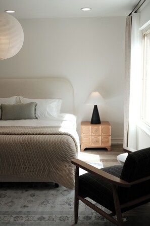 Elegant master suite with soft sunlight 