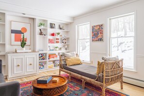 This daybed in the colorful library is the perfect place to dream. 